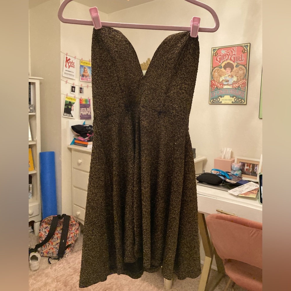 Strapless black dress with gold sparkle